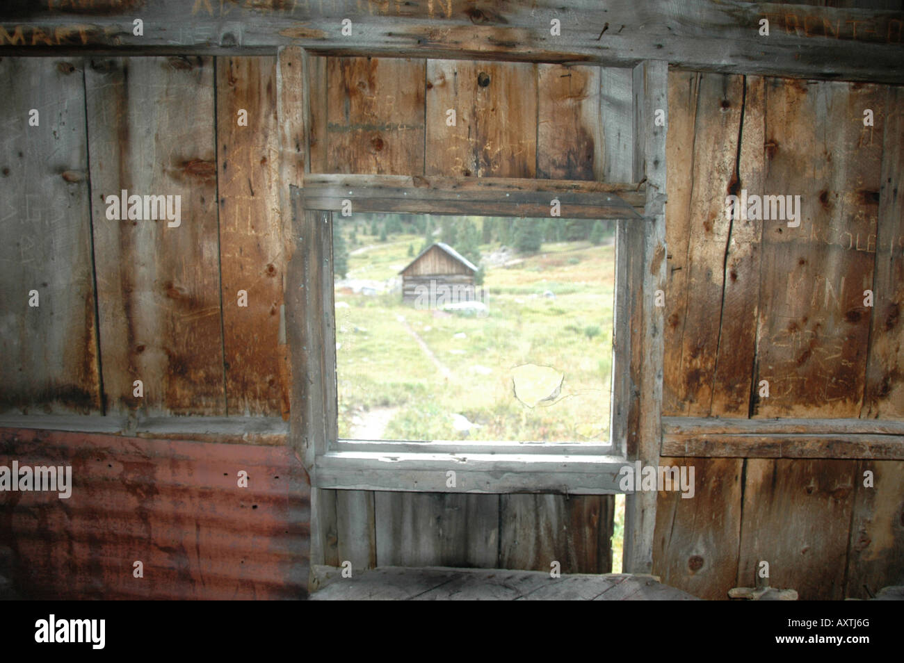 View out of the window of one of the old miners' huts, Holy Cross City, Eagle County, Colorado, USA Stock Photo