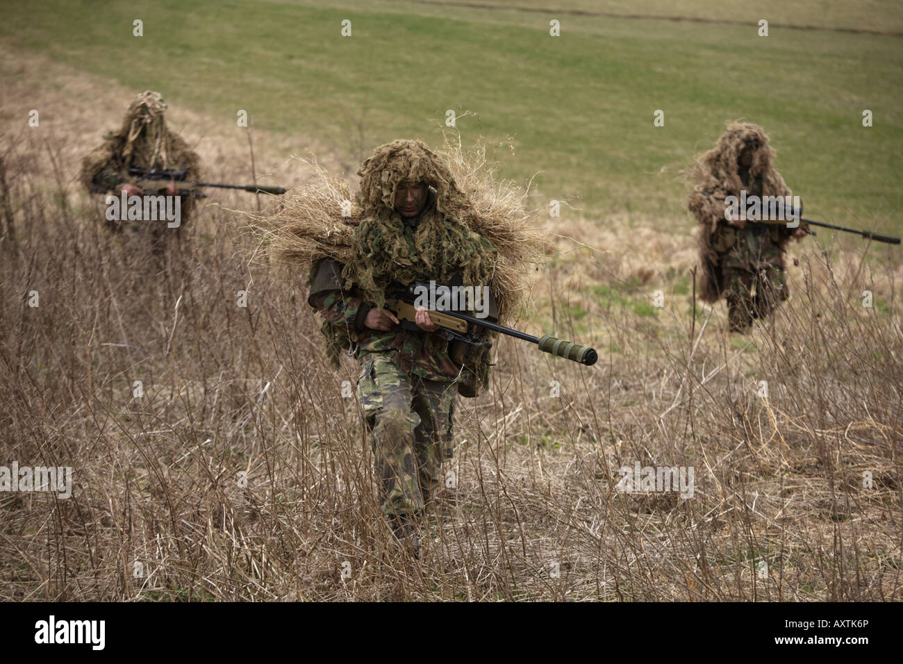 British Army Infantry soldiers demonstrate their newest L115A3 sniper rifle on firing ranges of the Support Weapon School UK Stock Photo