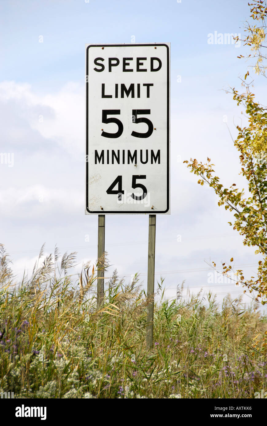 Traffic sign on the interstate freeway showing maximum and minimum speed  limits on the same sign Stock Photo - Alamy