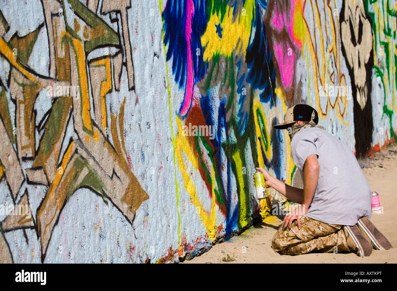 Graffiti painting legally on a designated wall Venice Beach Los Angeles