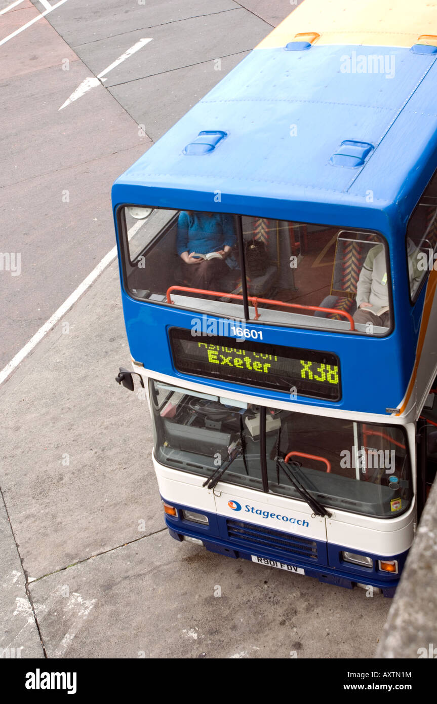 Lady reading on a bus, Plymouth, Top View Stock Photo