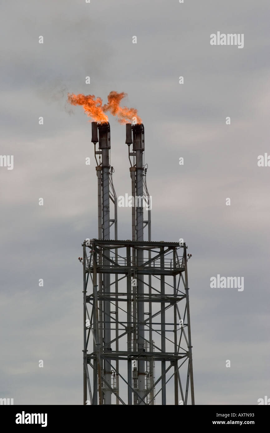 Flare stack at oil refinery in Seria , Brunei Stock Photo - Alamy
