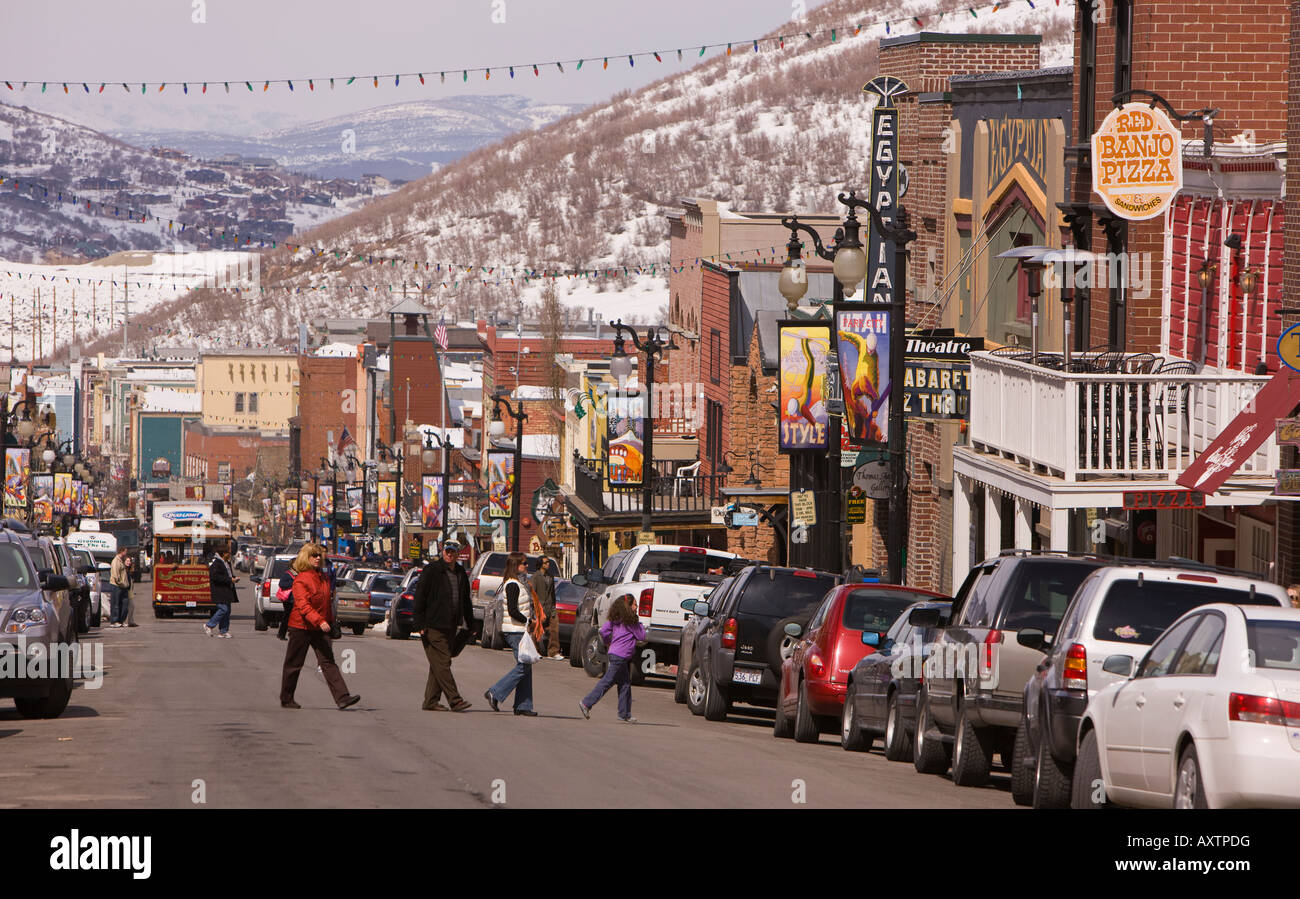 PARK CITY UTAH USA People cross Main Street. Park City, a historic mining town, is now a ski resort Stock Photo