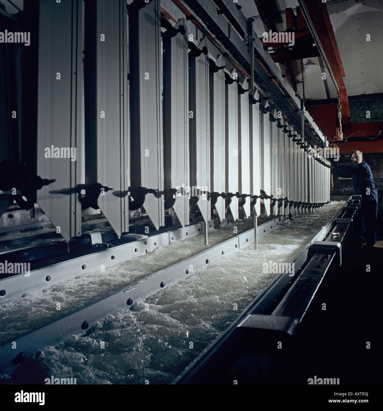 Anodising aluminium extrusions for architectural cladding and window frames in the construction industry Stock Photo