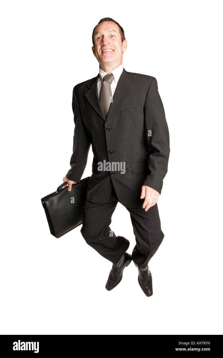 Business man iin a white background with a suitcase jumps in a black