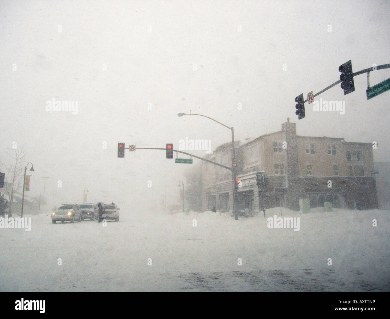 Traffic intersection during a winter storm. Mammoth Lakes, California. USA. Stock Photo