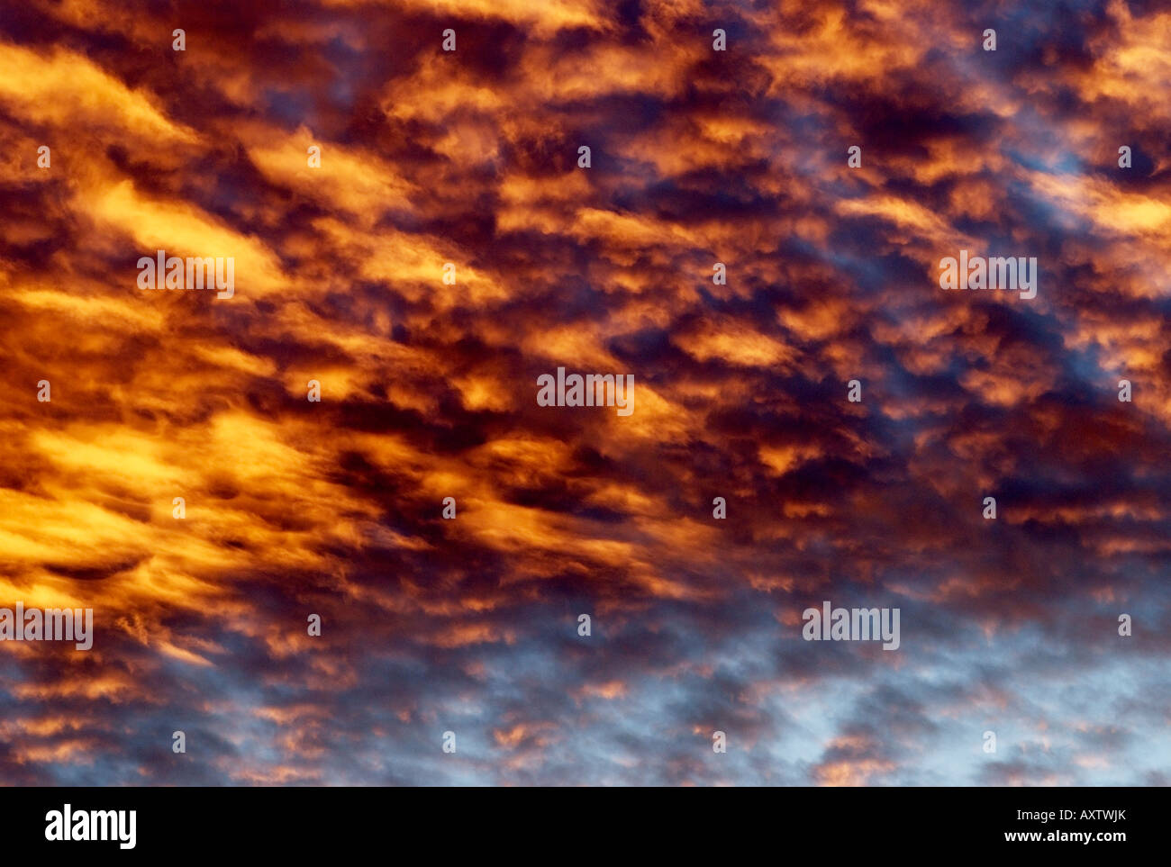 Dramatic sunset with clouds on fire Stock Photo - Alamy