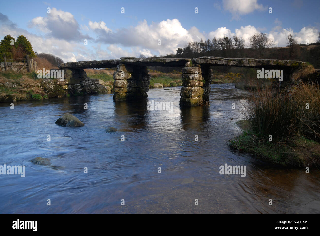 Medieval clapper bridge at Postbridge, Devon, Dartmoor, England Stock Photo