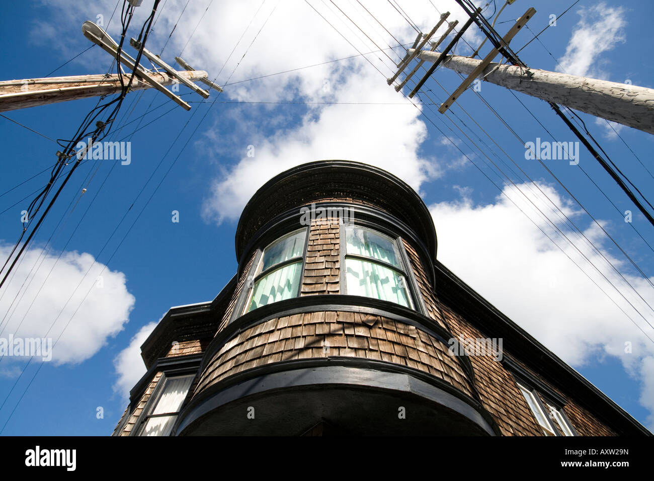 San Francisco home against a blue sky with puffy clouds. Stock Photo