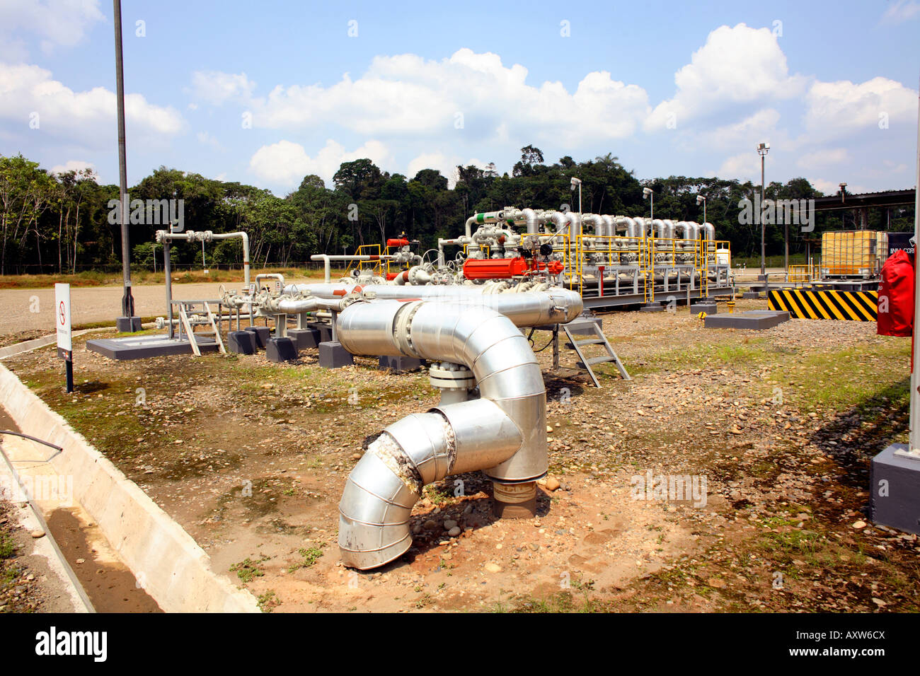 Oil pipeline leading from an oil well in the Ecuadorian Amazon Stock Photo