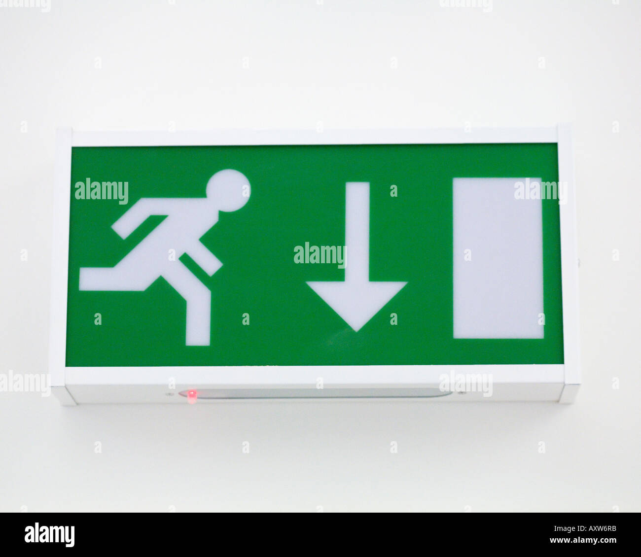Emergency Exit green sign rush Stock Photo - Alamy