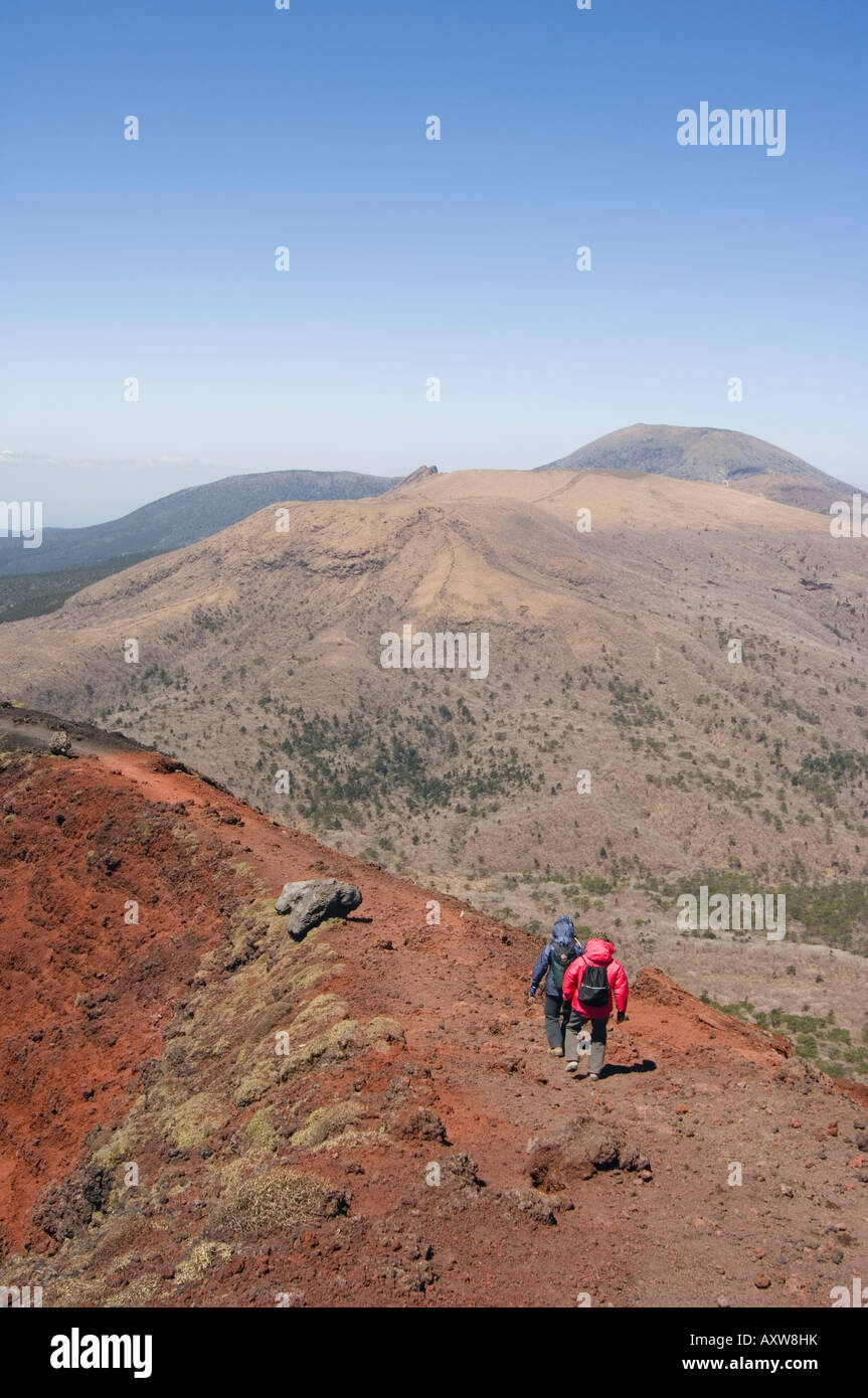 Hikers, volcanic scenery and hiking trail, Kirishima National Park ...