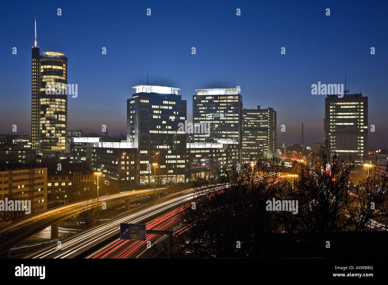 skyline of Essen with highway A 40, RWE Tower and buidings of Evonik and Postbank, Germany, North Rhine-Westphalia, Ruhr Area, Stock Photo
