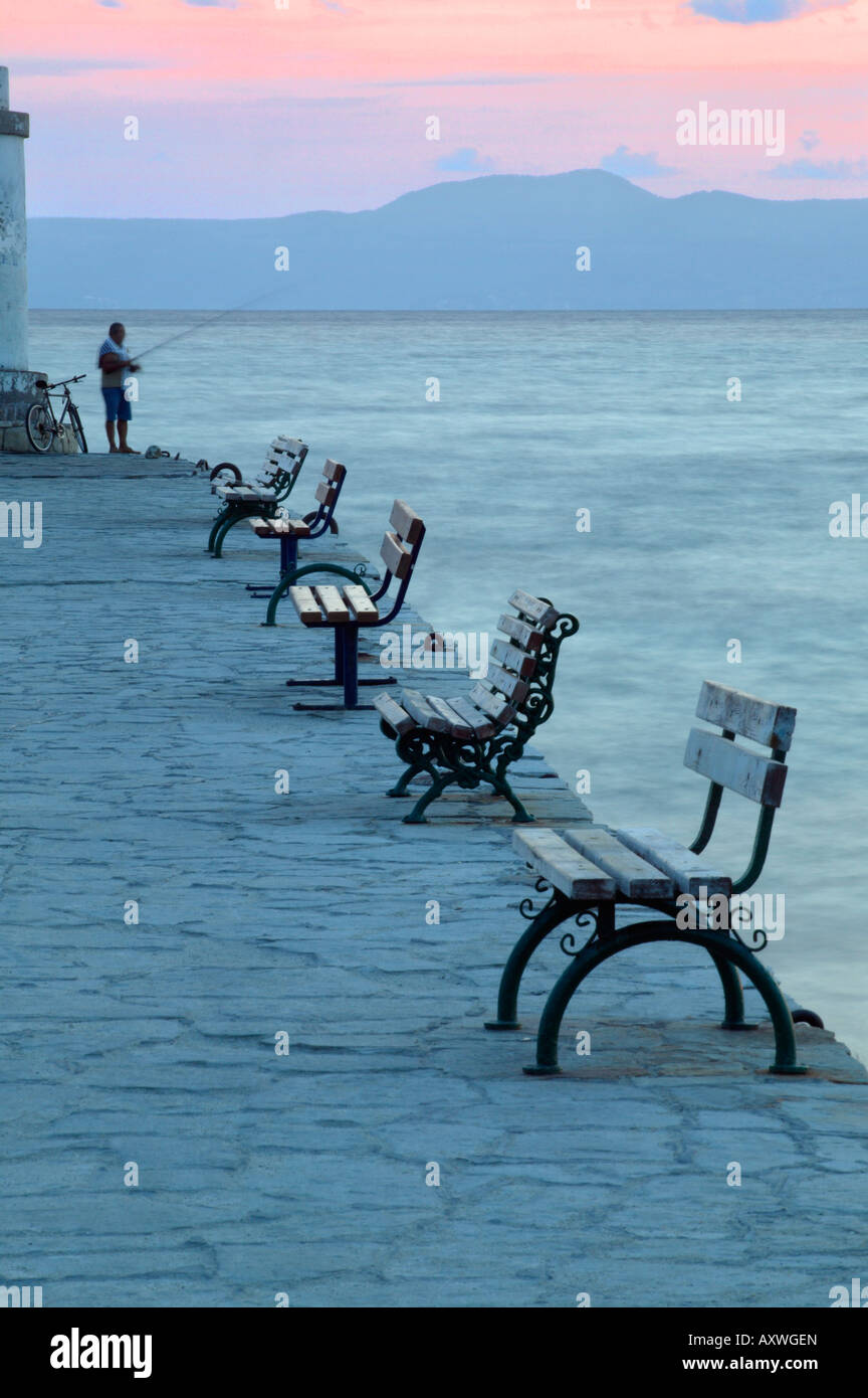 Fishing on jetty at dawn, Halkidiki, Greece, Europe Stock Photo