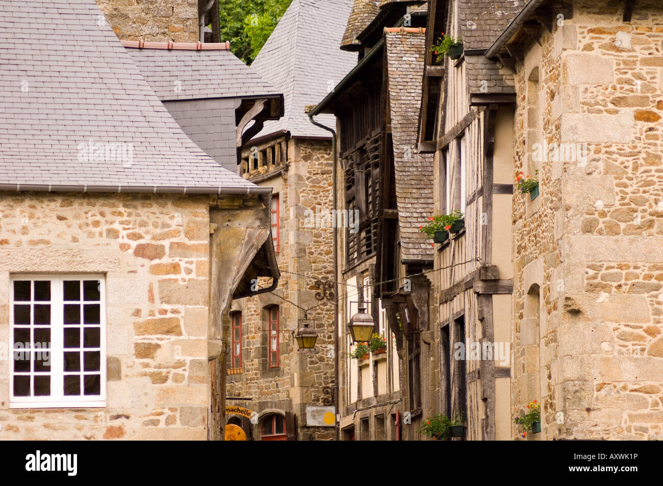 Old half timbered and stone buildings in the picturesque village of Dinan, Brittany, France, Europe Stock Photo
