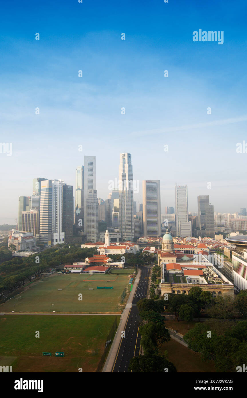 Singapore city skyline at dawn with the Padang and Colonial District in the foreground, Singapore, Southeast Asia, Asia Stock Photo