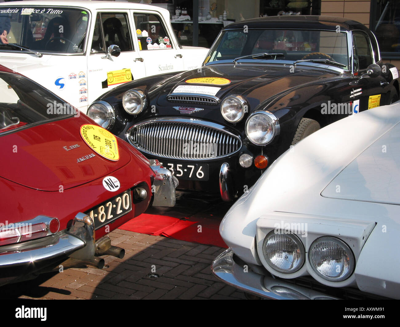 four rally cars in parc ferme at International Horneland Rally a classic car rally in the Netherlands Stock Photo