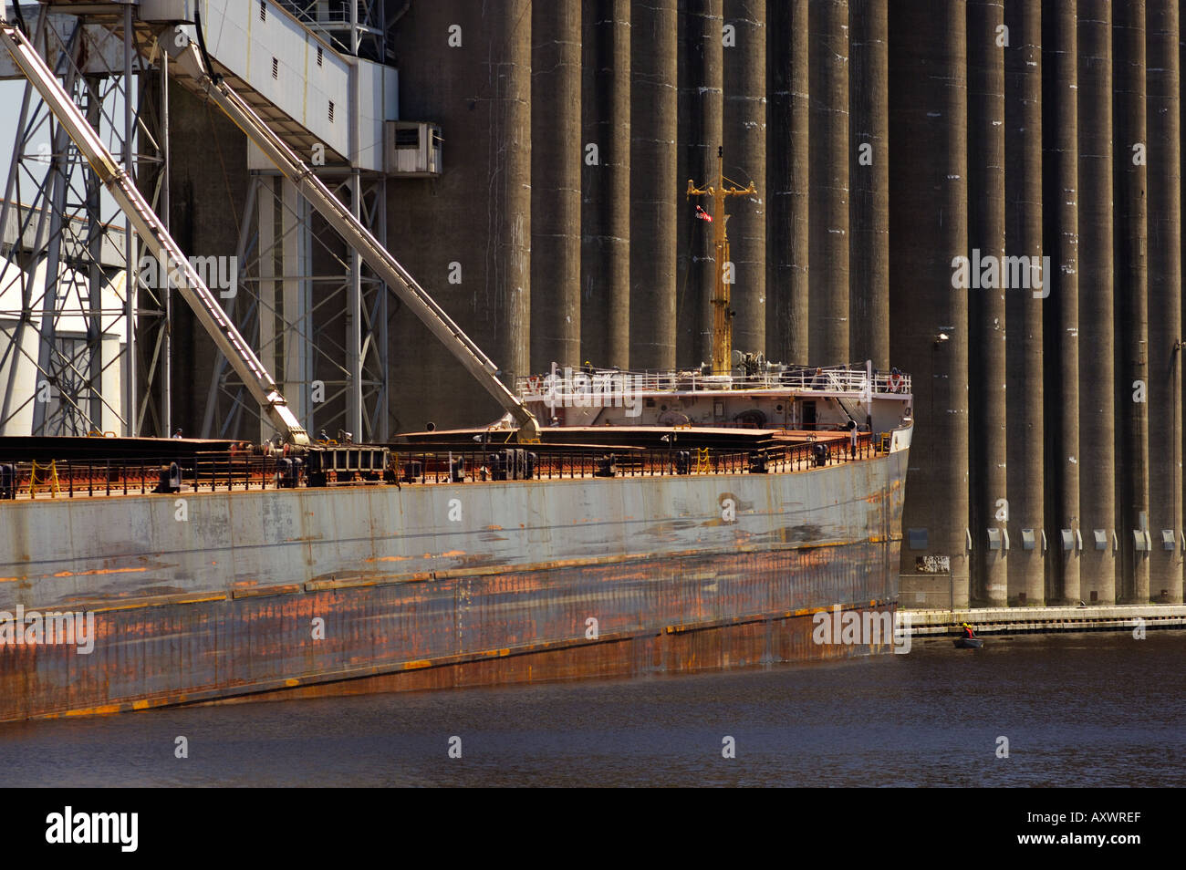 Great Lakes ship being loaded at lakeside elevator near Duluth ...