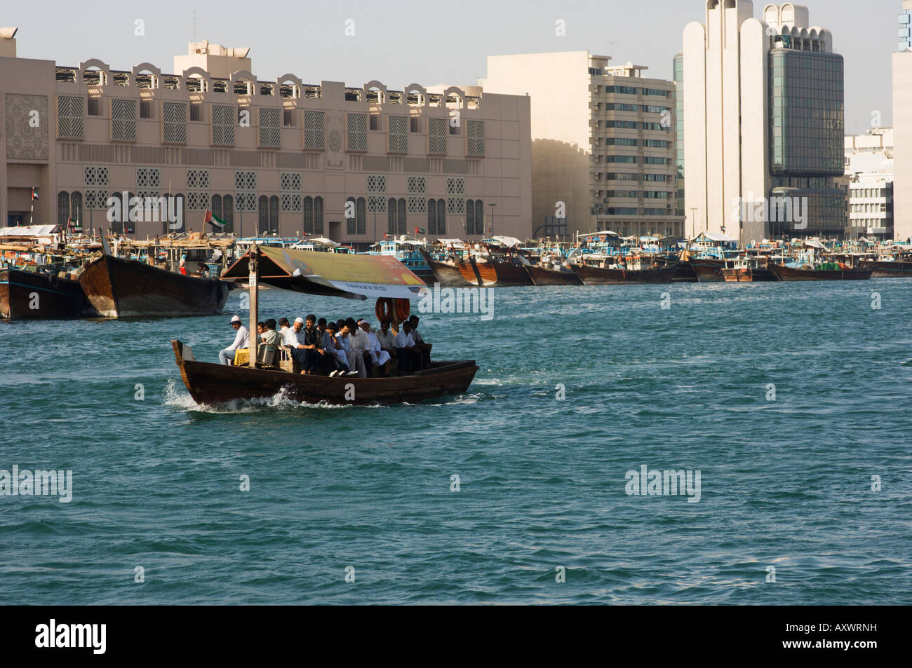 An abra (ferry) crossing Dubai Creek, Dubai, United Arab Emirates, Middle East Stock Photo