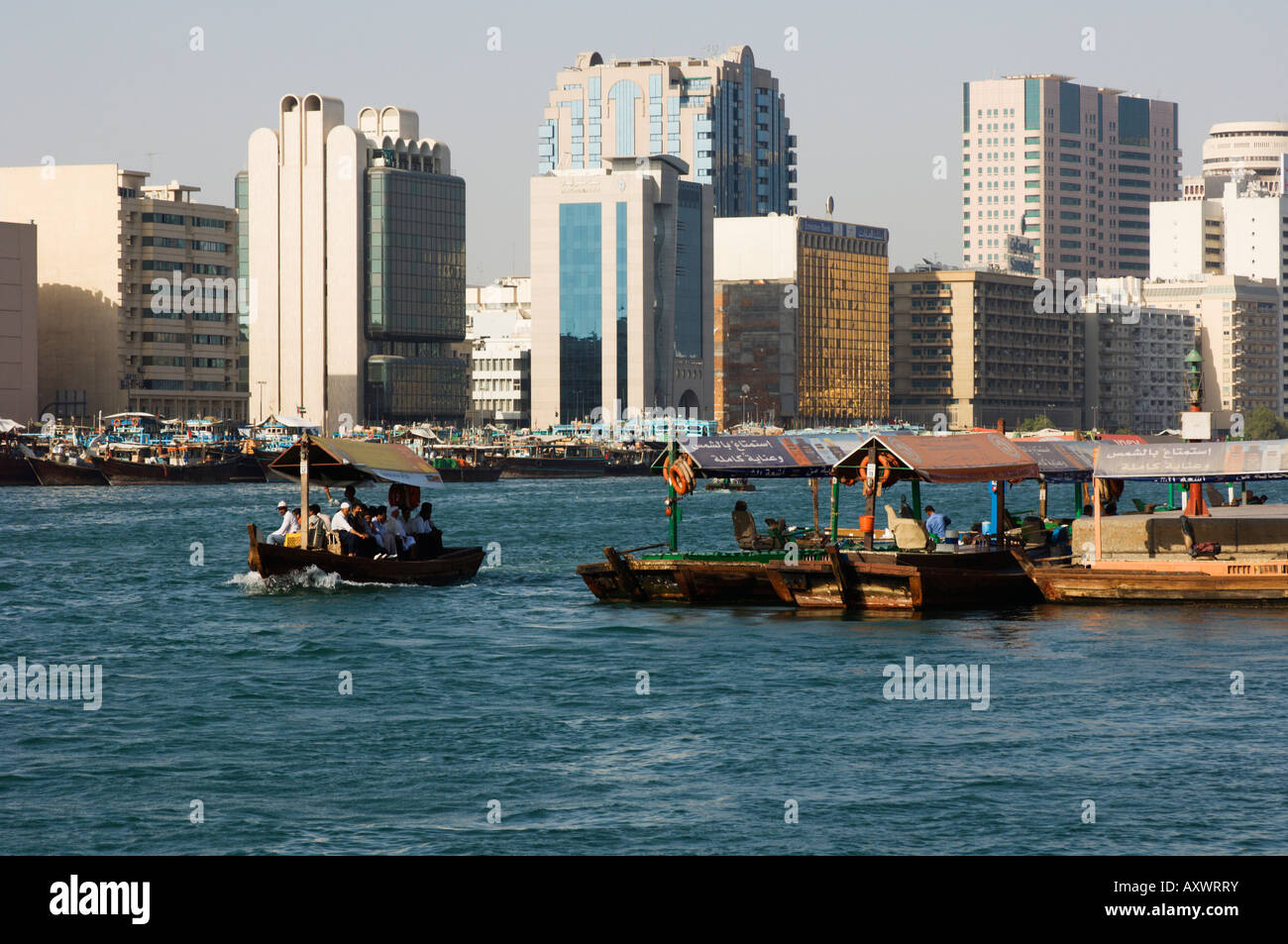 Abras (small ferries) crossing Dubai Creek, Dubai, United Arab Emirates, Middle East Stock Photo