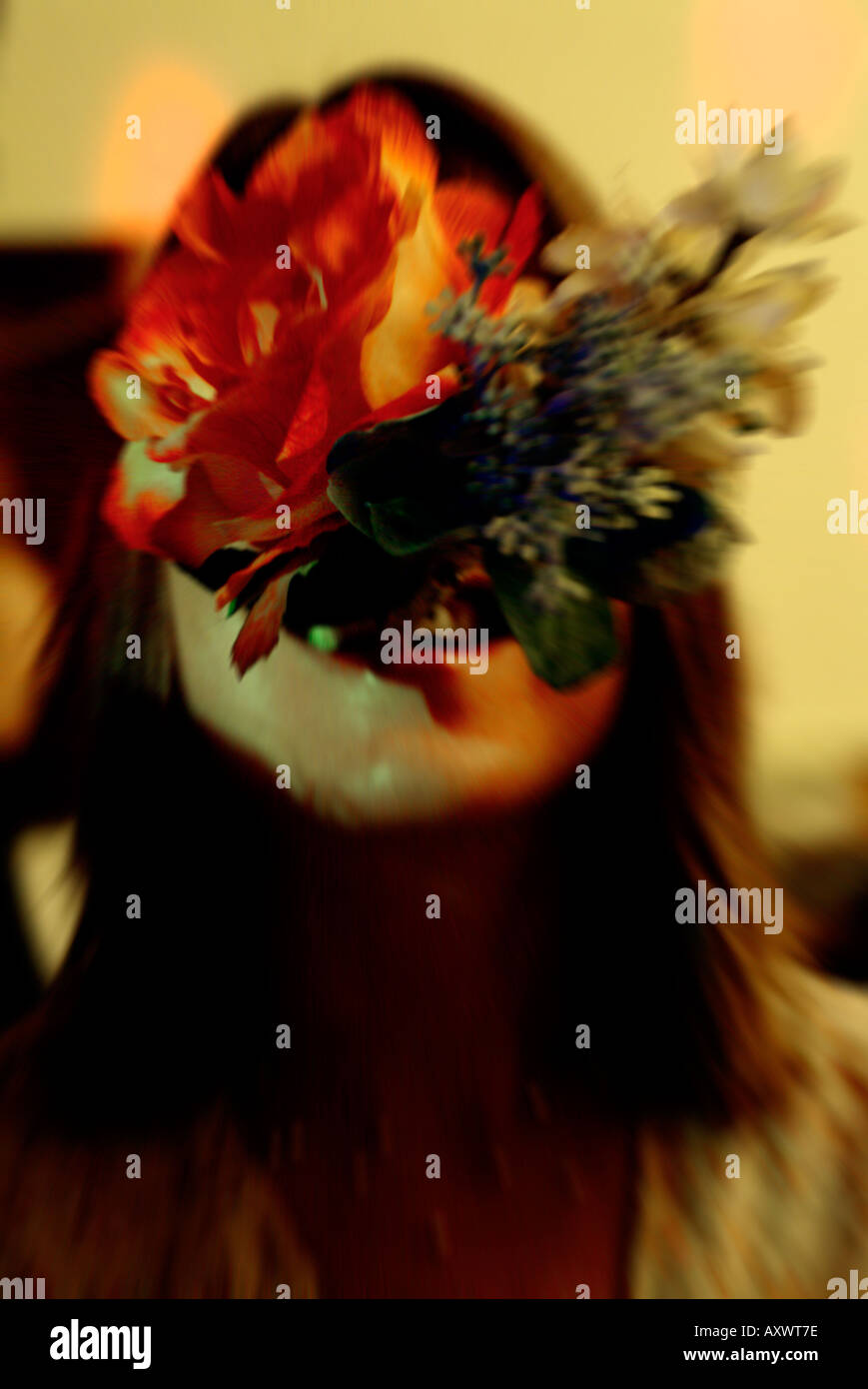 girl with flowers in mouth Stock Photo Alamy