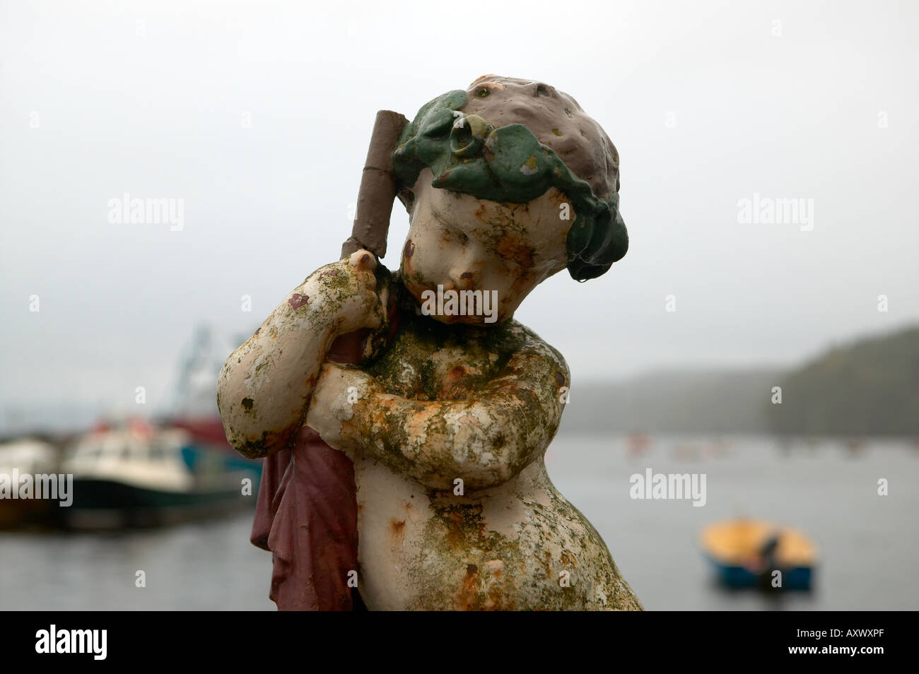 Statue on seafront, Tobermory, Isle of Mull, west coast of Scotland, United Kingdom Stock Photo
