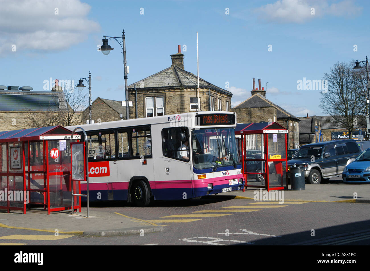 Single decker first bus in bus station in england Stock Photo