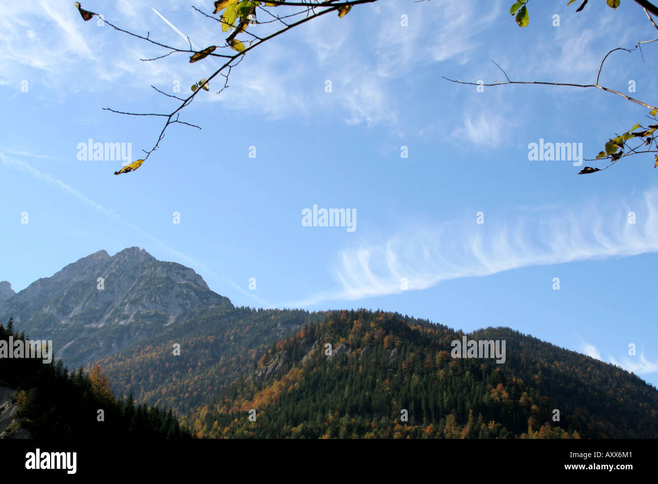 cloud formation on a blue sky in autumn scenery Hinterriss Eng Karwendel Tyrol Austria Stock Photo
