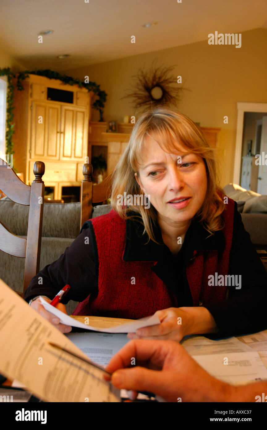 Middle aged woman planning for retirement and financial planning Stock