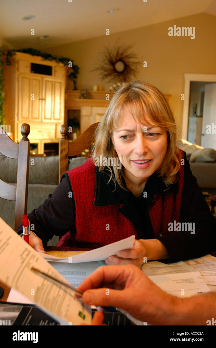 Middle aged woman planning for retirement and financial planning Stock
