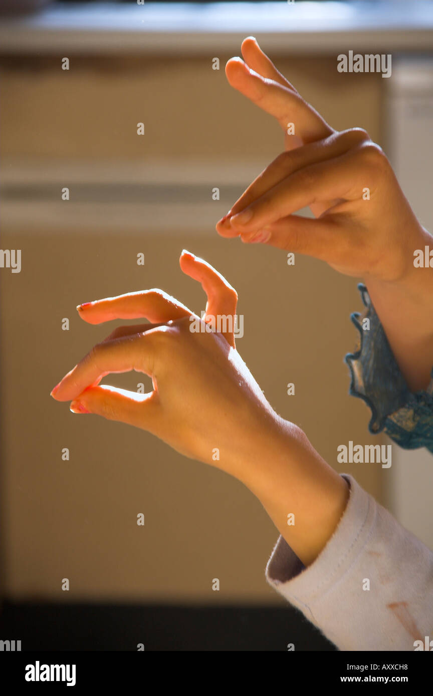 child making shapes with fingers Stock Photo Alamy