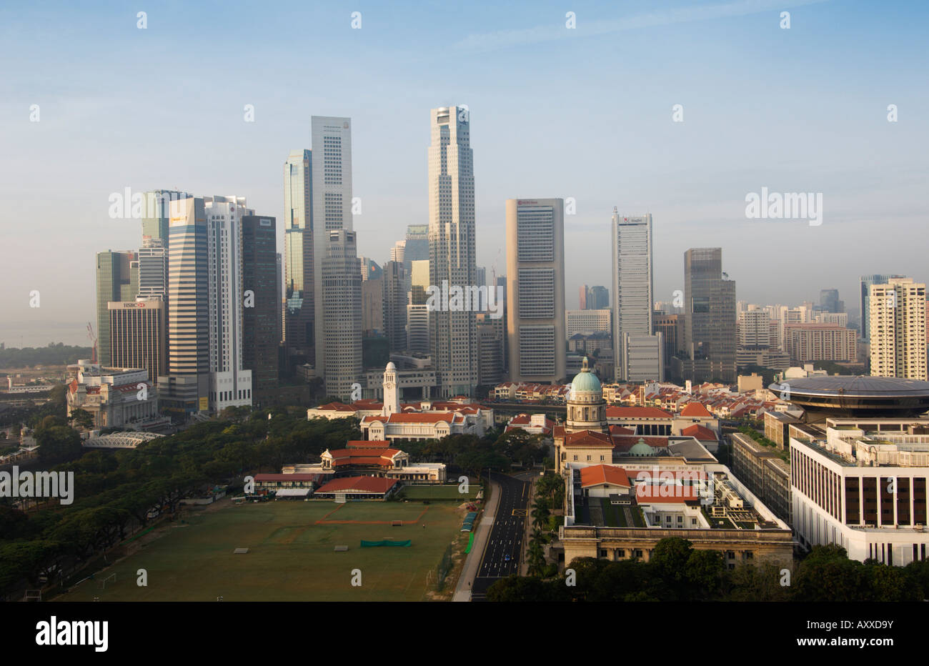 Singapore skyline with the Padang and Colonial District in the foreground, Singapore, South East Asia Stock Photo