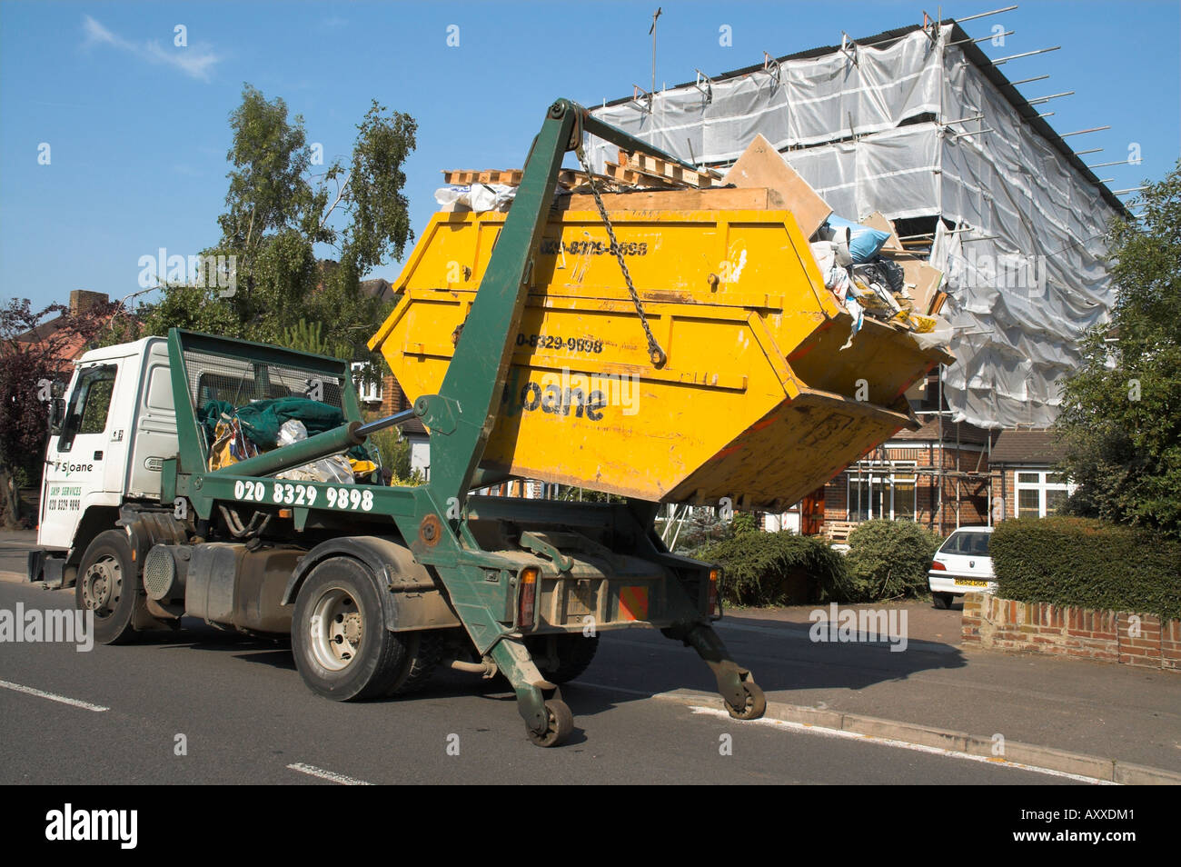 construction site skip lorry Stock Photo - Alamy