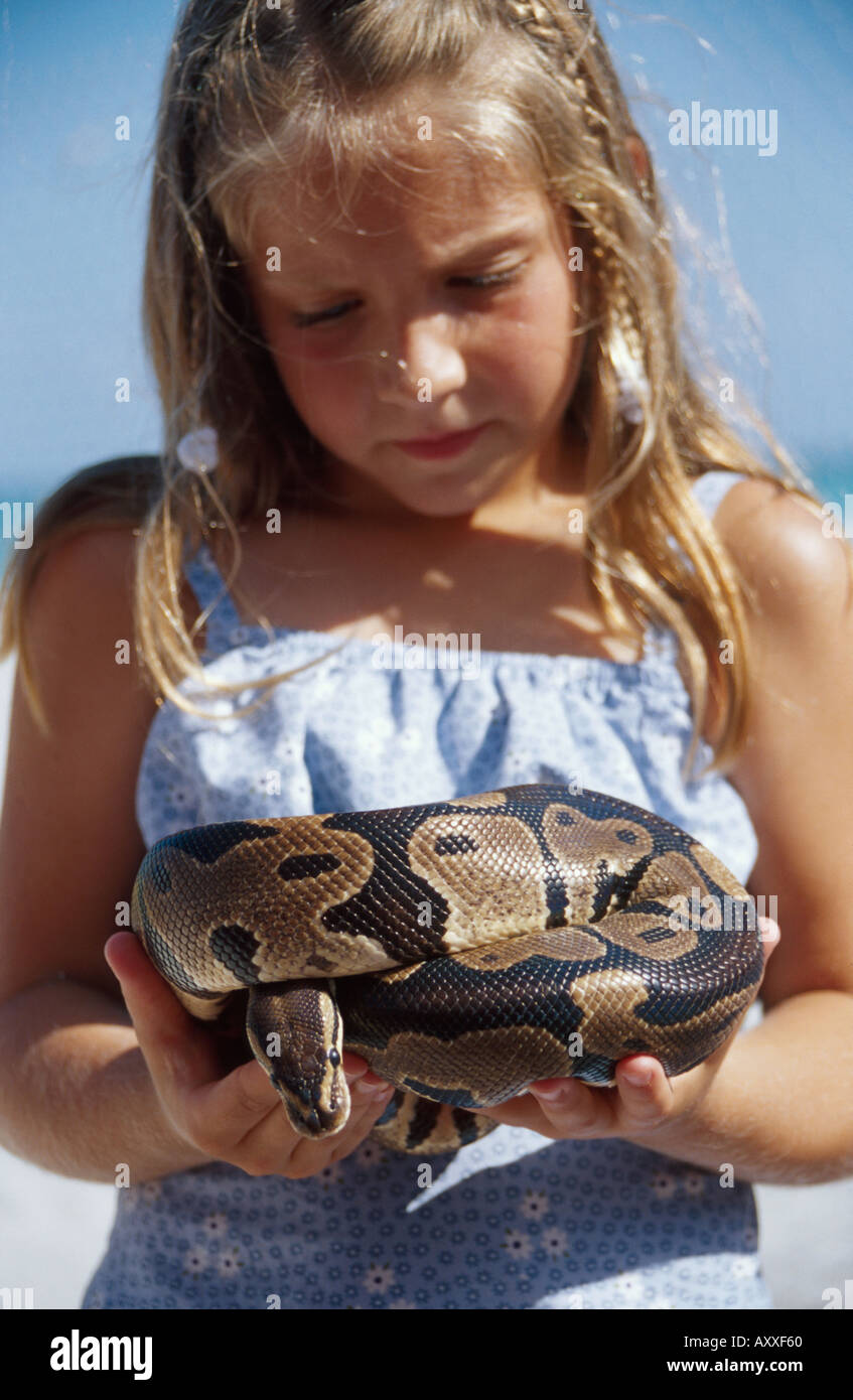 Woman holds snake hi-res stock photography and images - Alamy