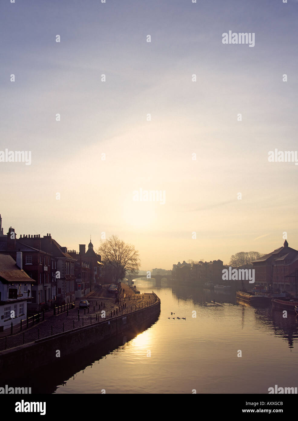 Early morning Winter light on the river Ouse taken from Ouse bridge in York, North Yorkshire Stock Photo