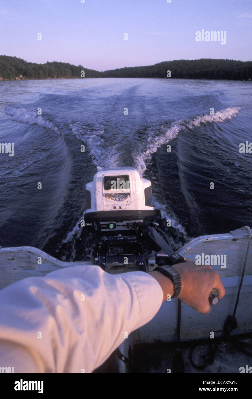 View over outboard motor on a Canadian lake in Central Ontario cottage