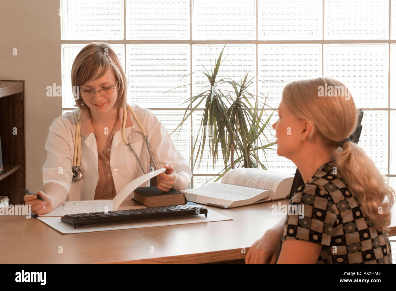 Counseling session with doctor and patient. Stock Photo