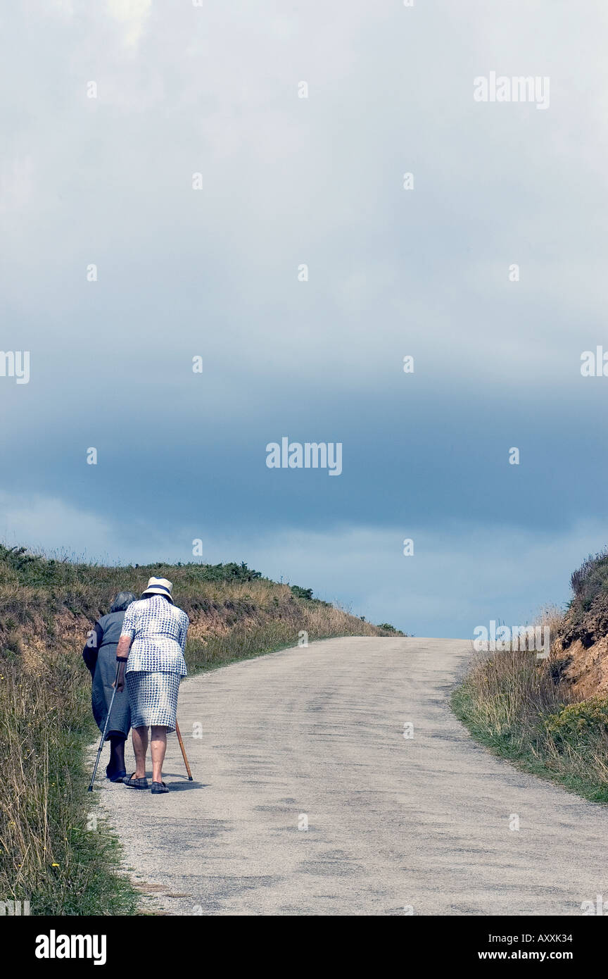 Senior women walking uphill, galicia, spain Stock Photo