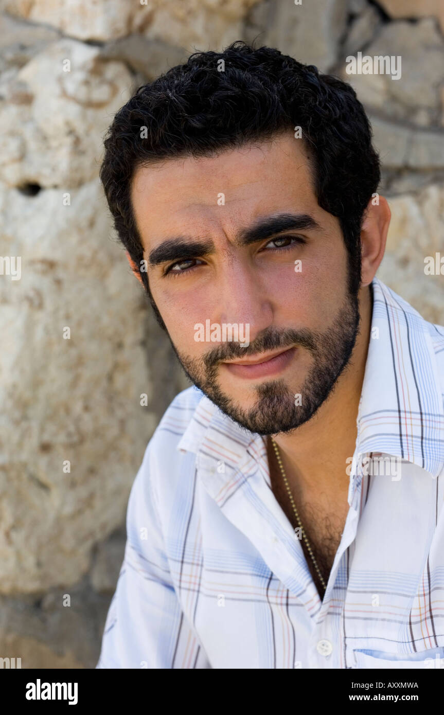 Young Muslim Arabic man with a beard portrait Stock Photo - Alamy