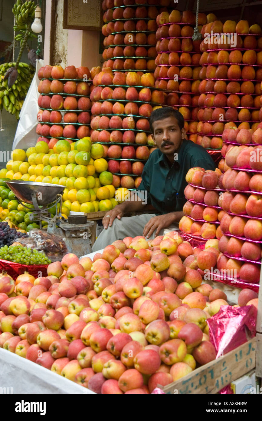 Mysore fruit market with various apples and citrus fruits piled high