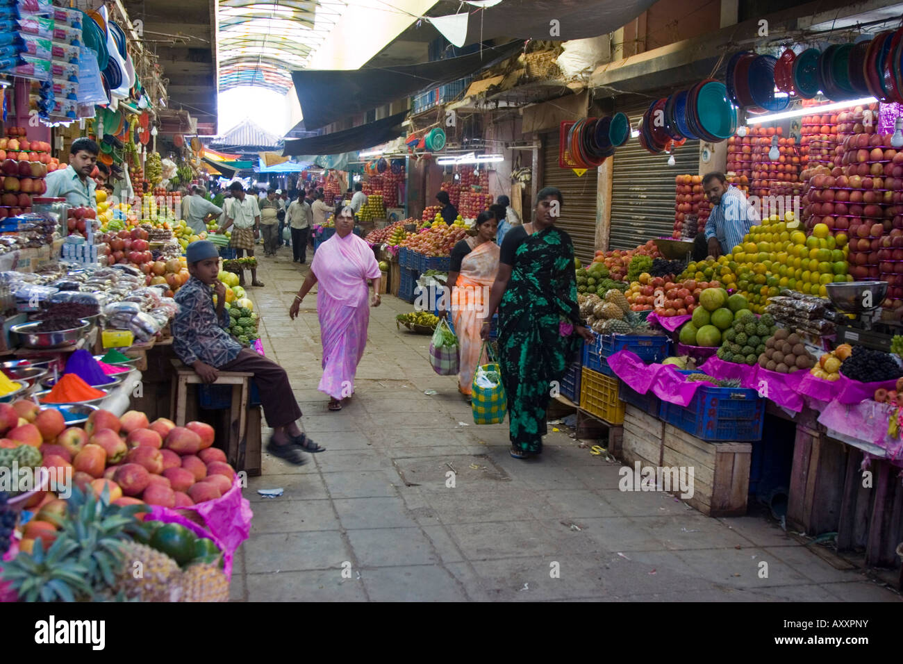 Mysore fruit market with various apples and citrus fruits piled high ...