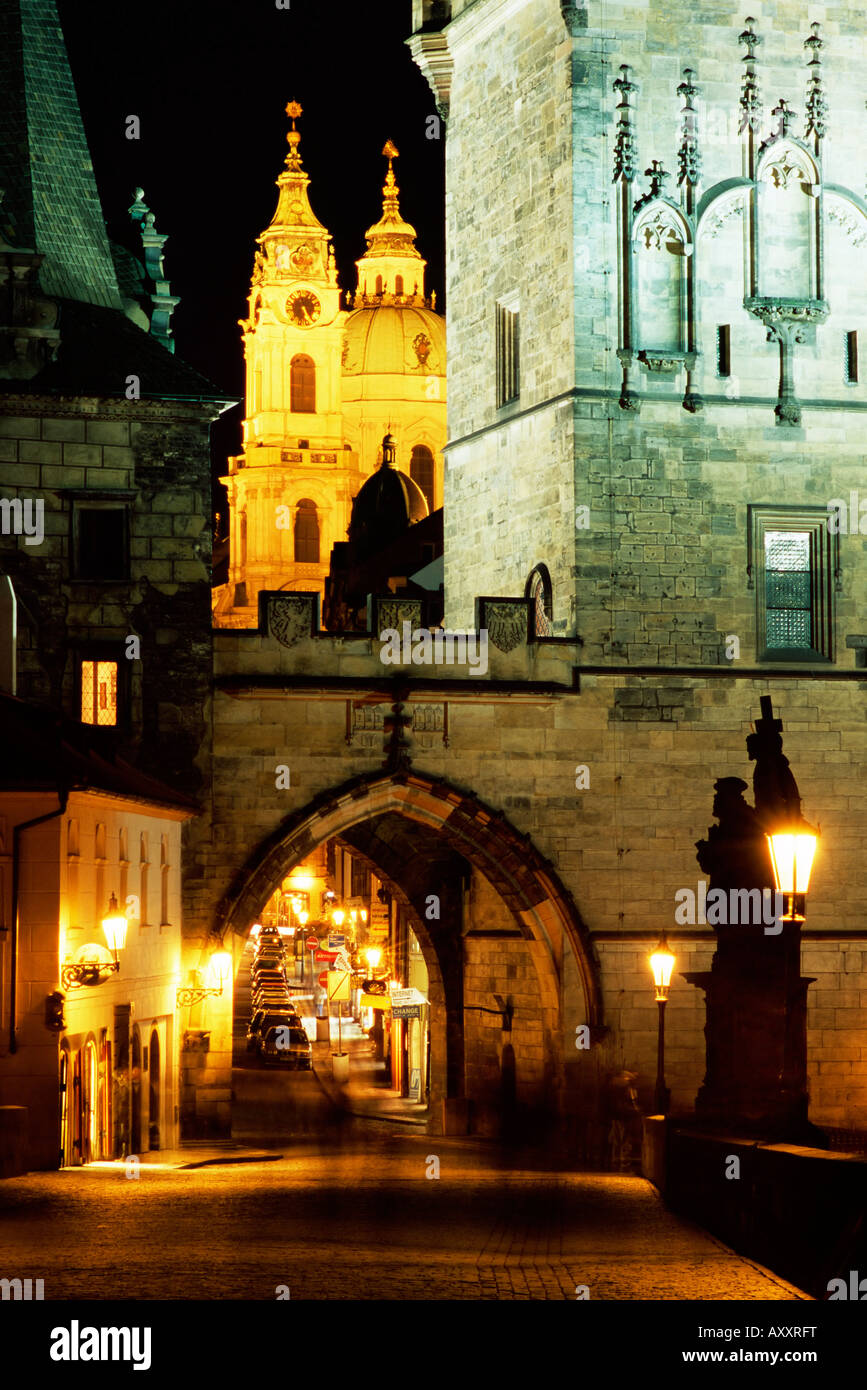 Romanesque and Gothic Malostranske bridge towers, at night, Mala Strana, Prague, Czech Republic Stock Photo