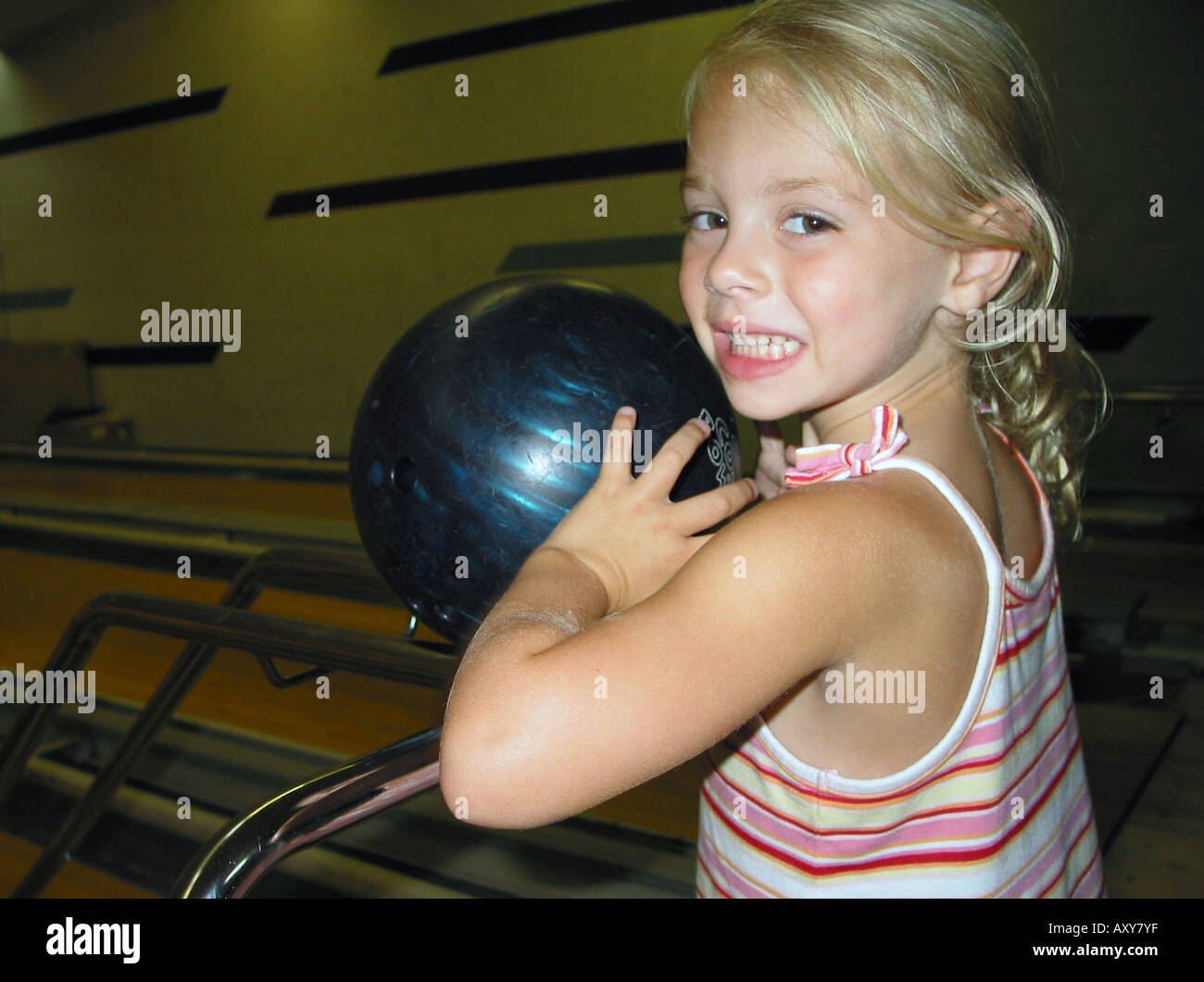 Child getting ready to bowl Stock Photo