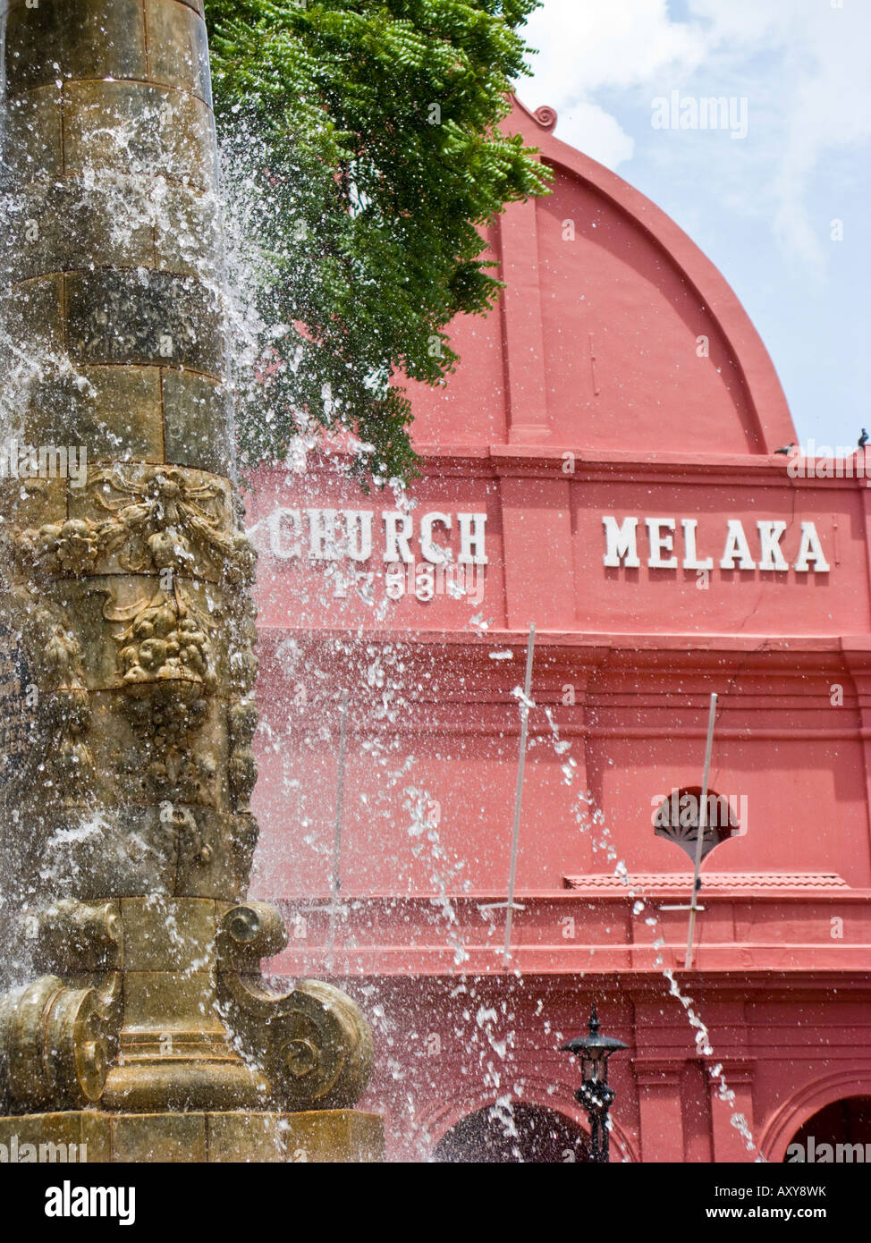 Christ Church, Malacca Town, Bandar Melaka, Malaysia, with fountain of Queen Victoria in the foreground Stock Photo