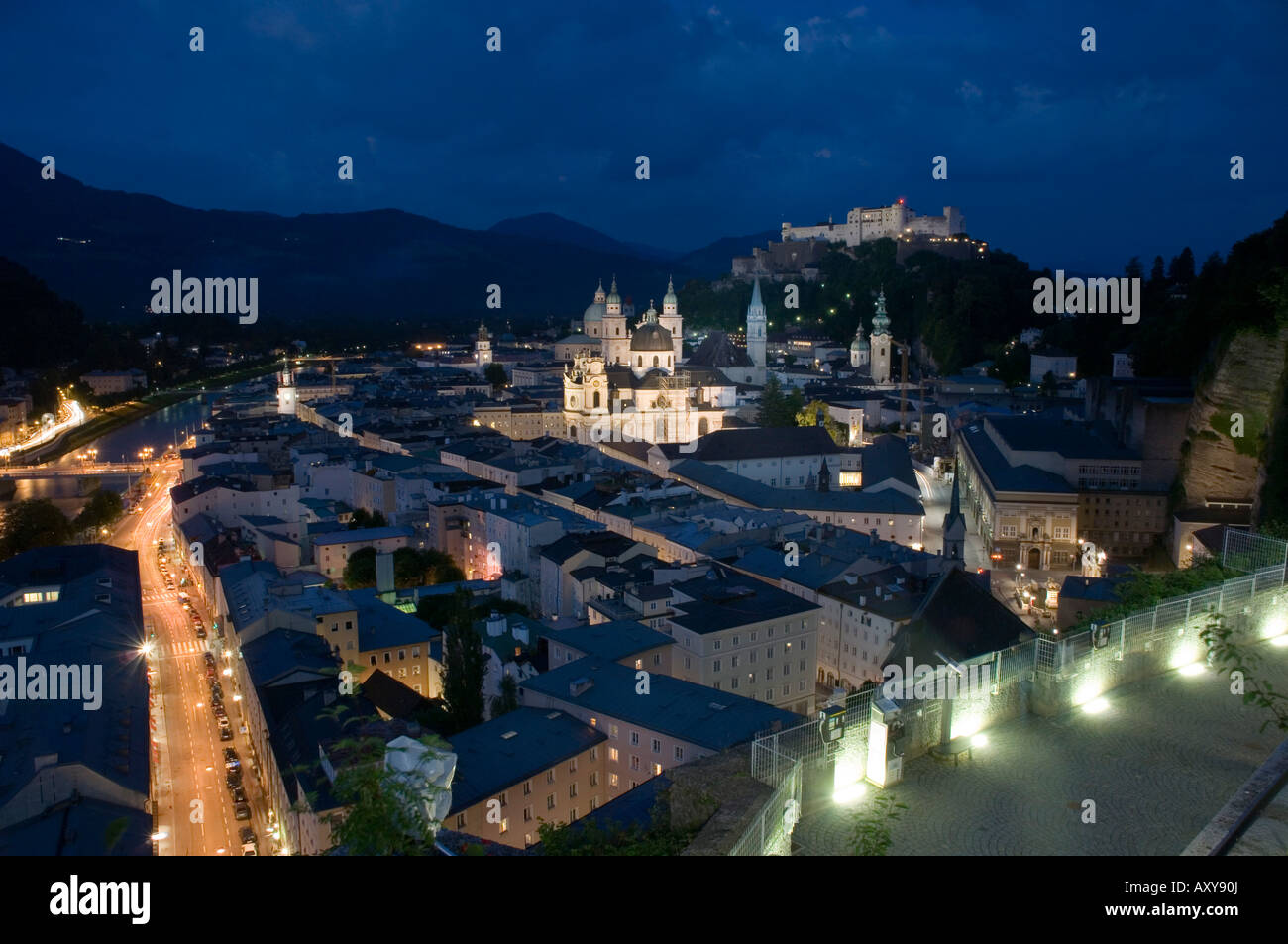 Cityscape showing Schloss Hohensalzburg, dusk, Saltzburg, Austria Stock Photo