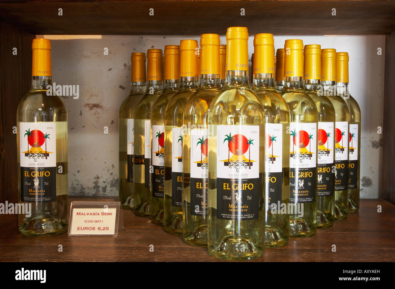 Semi sweet 'El Grifo' white wine on display in El Museo del Vino in the wine producing region of La Geria on Lanzarote. Stock Photo