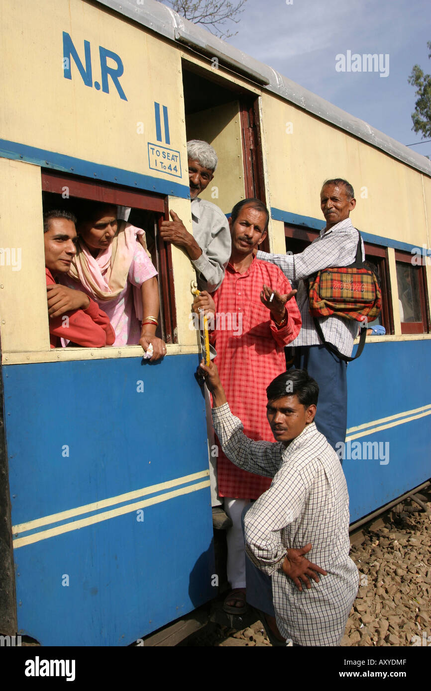 India transport passengers people boarding on rural train Stock Photo
