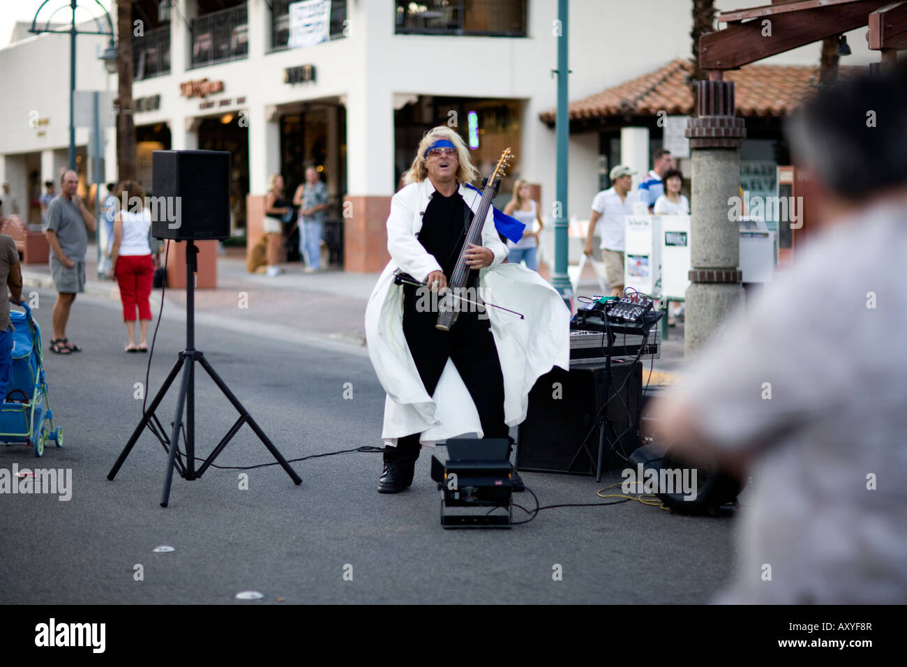 Street Musician Bowing an Electric Guitar Stock Photo Alamy