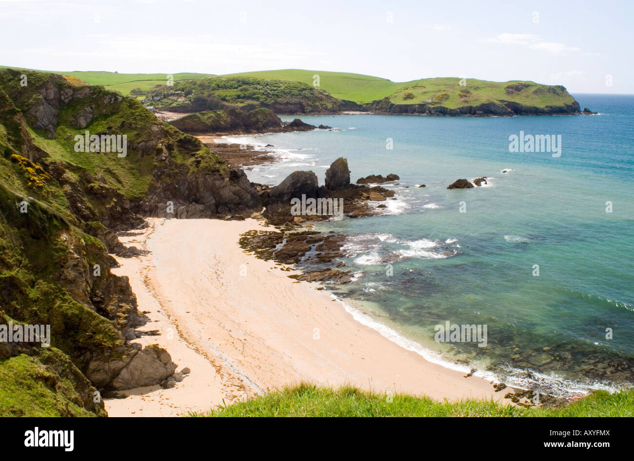 A small sandy beach near Woolman Point and Hope Cove, south Devon, England, United Kingdom, Europe Stock Photo