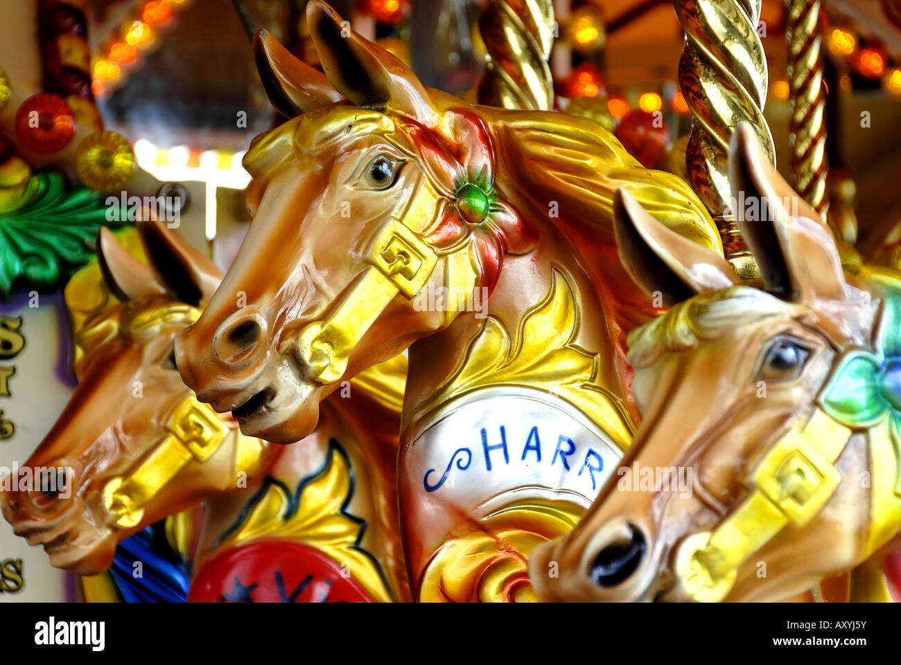 Colourful Carousel fairground horses Stock Photo